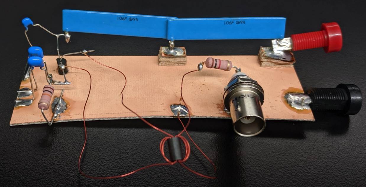 A picture containing table, small, laptop, laying
Description automatically generated